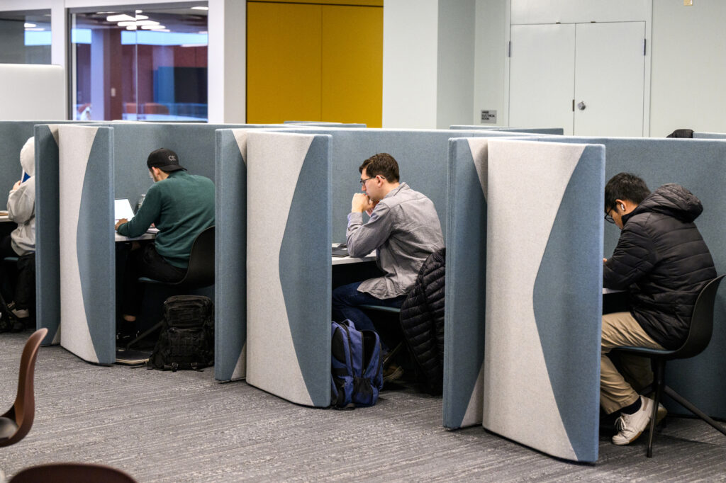 Students study in the renovated 4th floor of Snell Library