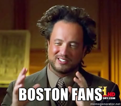 Photo of a man with messy hair and a smile, holding his hands apart, with the words "Boston Fans" 